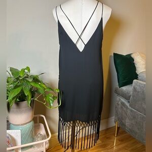 Little black dress, low back with fringe